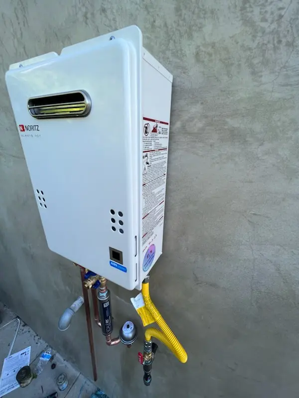 Tankless water heater installation for Circle J homes